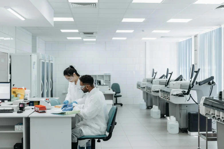 a couple of people that are in a lab, pexels contest winner, sterile minimalistic room, working hard, profile image, thumbnail