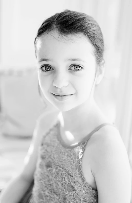 a black and white photo of a little girl, inspired by Elizabeth Polunin, 1 / 4 headshot, iris compiet, holly bruce, glittering and soft