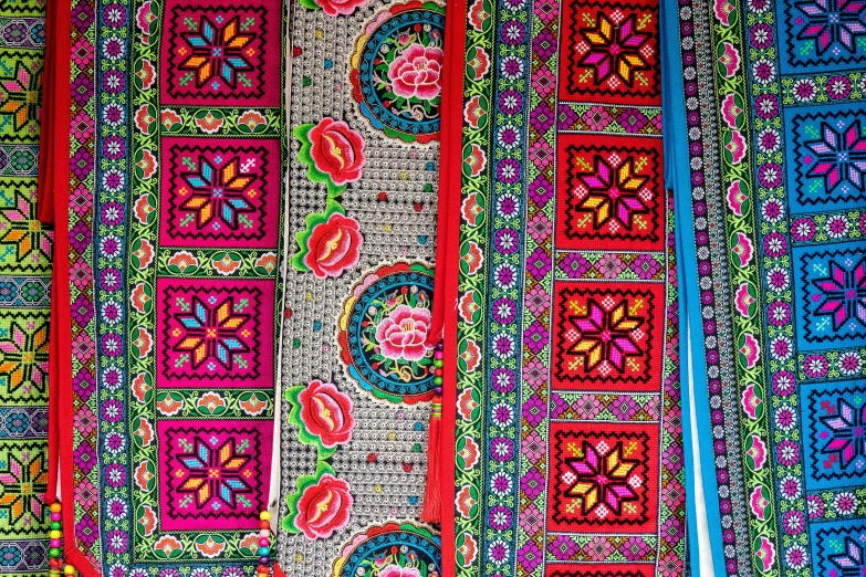 a wall that has a bunch of different designs on it, flickr, cloisonnism, colorful bandana, thailand, laces and ribbons, full of colour 8-w 1024