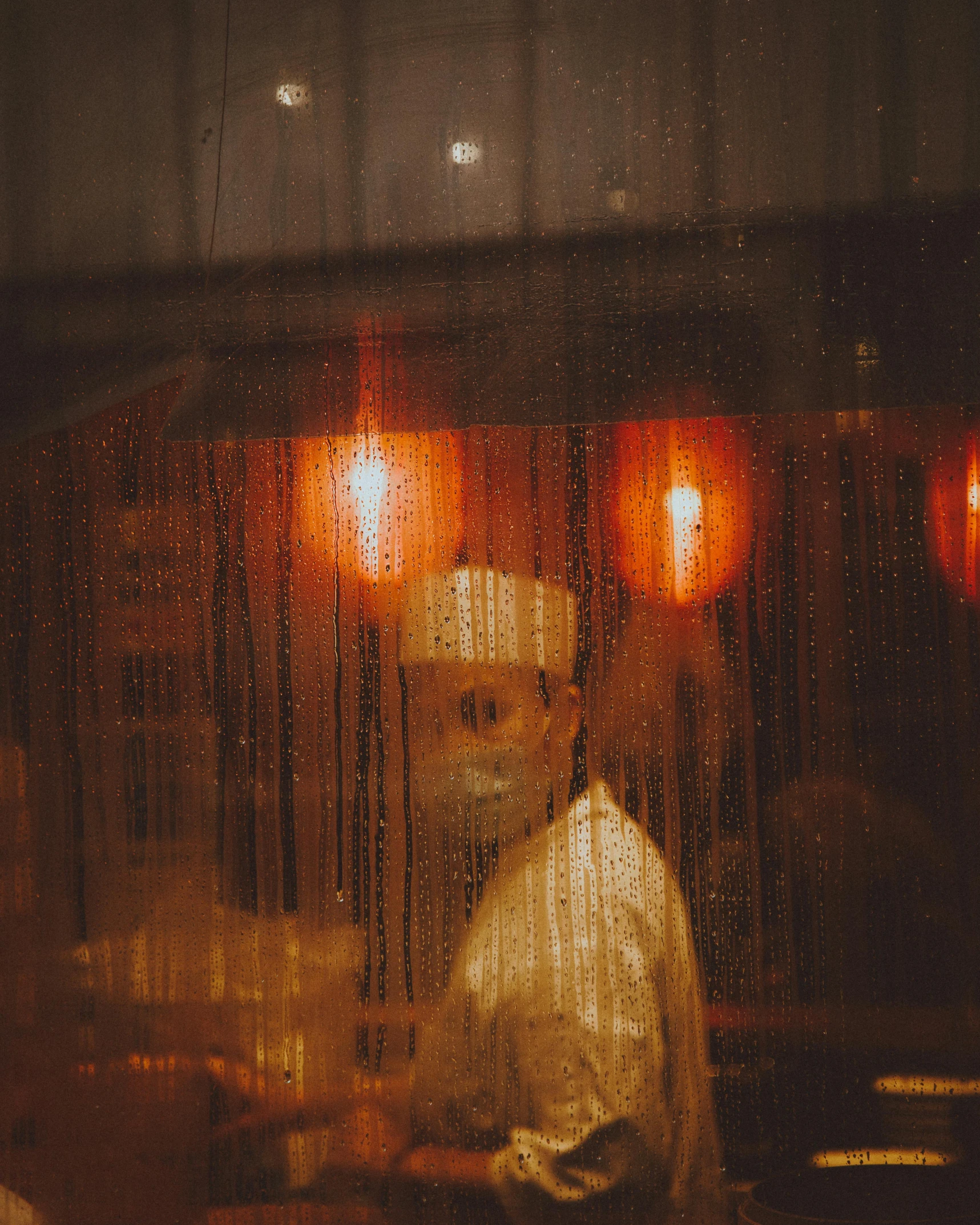a man that is standing in front of a window, by Elsa Bleda, pexels contest winner, wearing white chef hat, standing in a cantina, lgbtq, veiled face