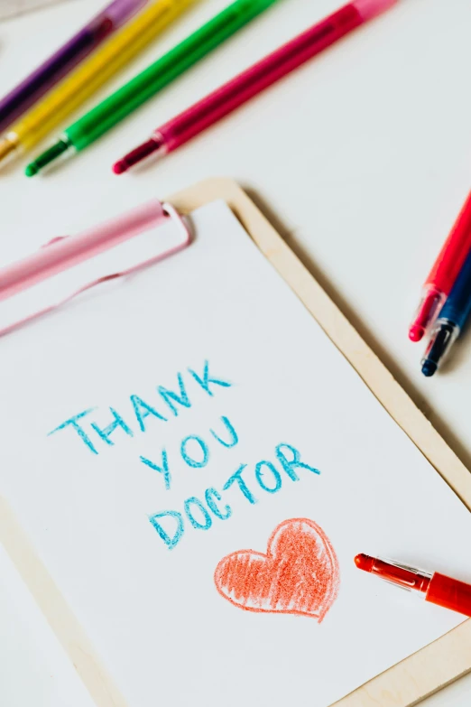 a clipboard with a thank you doctor written on it, a child's drawing, pexels contest winner, crayon art, square, 15081959 21121991 01012000 4k, tiffany dover, thumbnail