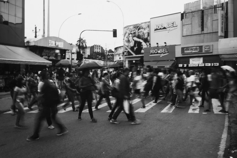 a crowd of people walking across a street, a black and white photo, pexels, hurufiyya, malaysian, people running, instagram post, mixed art