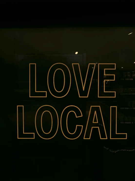 a sign that says love local on it, pexels, low-light, thumbnail, black, 7