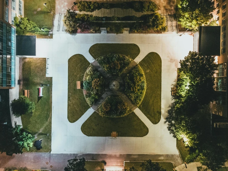 an aerial view of a park at night, an album cover, unsplash contest winner, on a great neoclassical square, student, outdoor photo, gardening