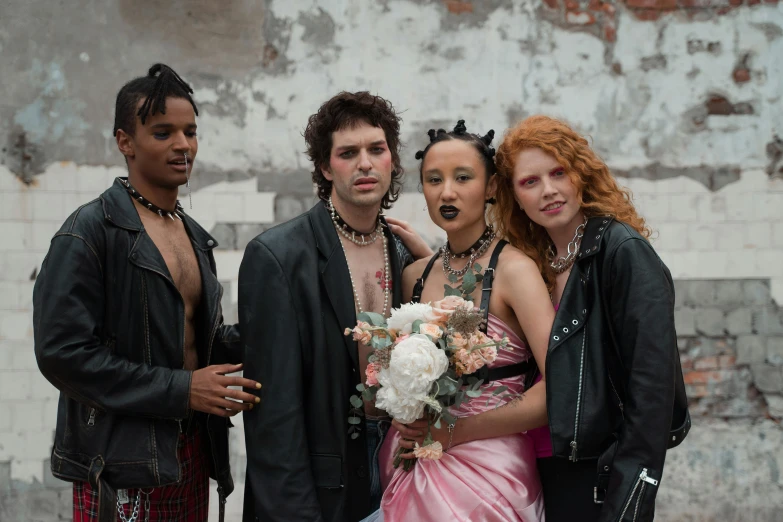 a group of people standing next to each other, by Anna Katharina Block, trending on pexels, renaissance, wearing a punk outfit, romantic lead, promotional image, wedding