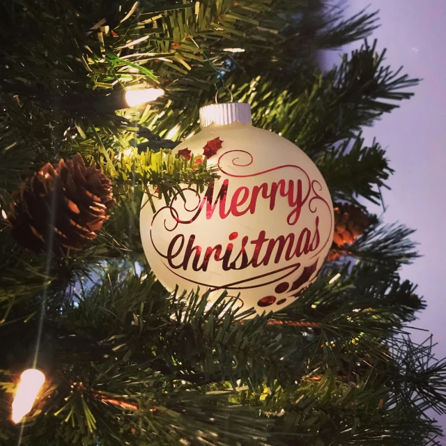 a christmas ornament hanging from a christmas tree, pixabay, graffiti, merry england, background image, full frame image, thumbnail