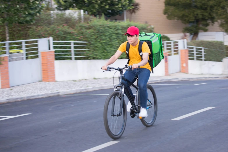 a man riding a bike with a backpack on his back, by Niko Henrichon, shutterstock, fast food, avatar image, chilean, 21 years old