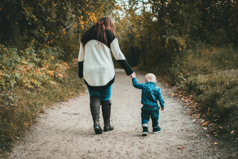 a woman and a child walking down a path, pexels, realism, handsome, toddler, paul barson, 15081959 21121991 01012000 4k