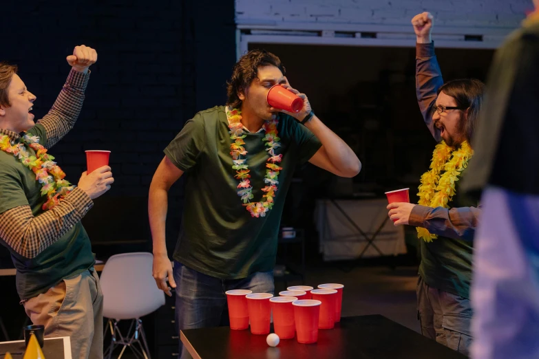 a group of men standing next to each other on top of a table, pexels contest winner, awkwardly holding red solo cup, playing games, hight decorated, profile image