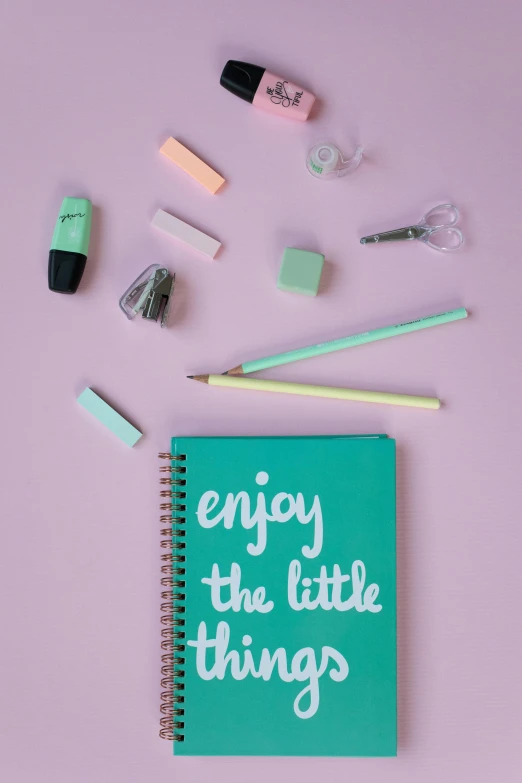 a notebook with the words enjoy the little things written on it, trending on pexels, happening, pastell colours, knolling, mint, happy girl