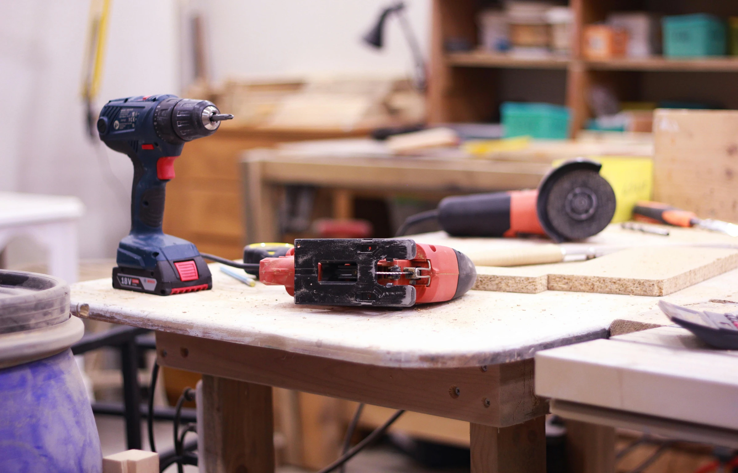 a couple of tools sitting on top of a table, profile image, in a workshop, thumbnail, small manufacture