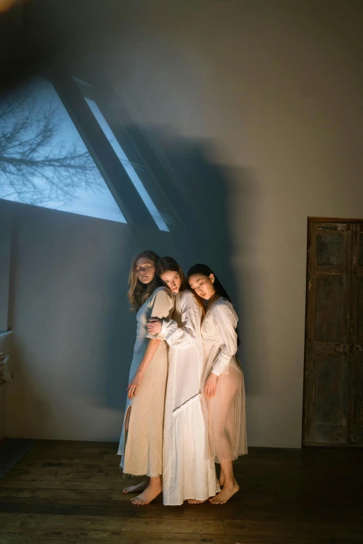 a couple of women standing next to each other in a room, inspired by Georges de La Tour, unsplash, romanticism, three women, ao dai, “ ethereal, ( ( theatrical ) )