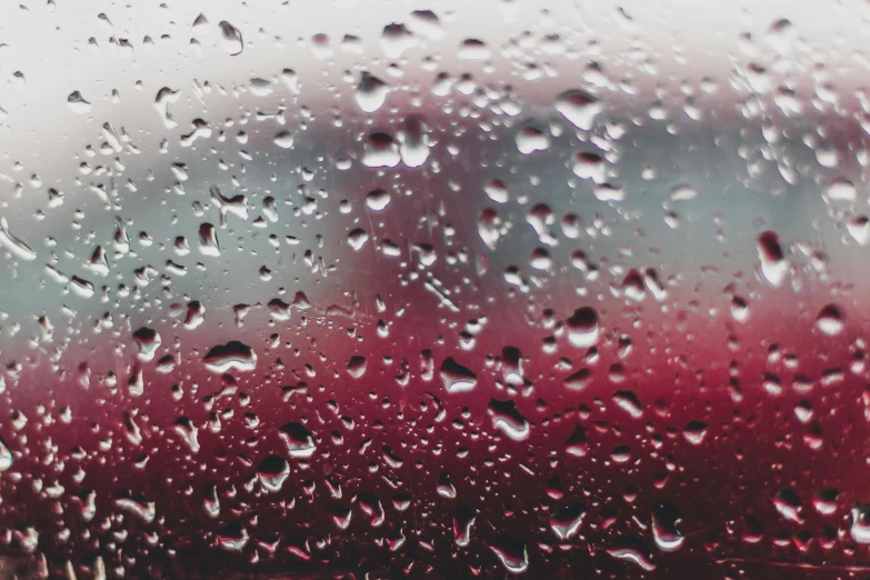 rain drops on a window with a red car in the background, trending on unsplash, visual art, magenta and gray, wine-red and grey trim, computer wallpaper, wet reflections in square eyes