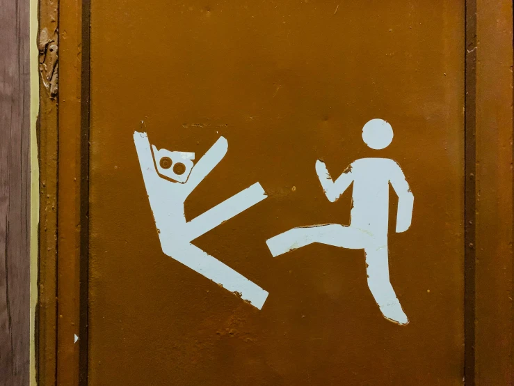 a close up of a door with a sticker on it, a cartoon, trending on pexels, street art, jumping leaping heroic attack, brown, drunk, two people