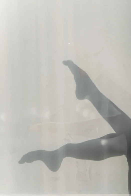 a close up of a person's legs in a bathtub, by Emily Shanks, conceptual art, clear silhouette, sun dappled, dancing in front of fog, lying on an abstract