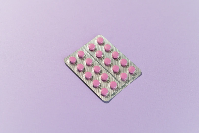pink pills in a blister pack on a purple background, by Jan Kupecký, pexels, antipodeans, on grey background, hedi slimane, sitting down, ultrarealistic
