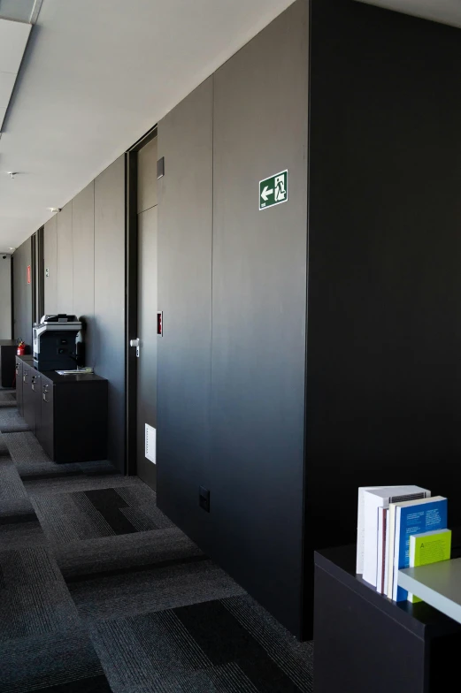 a view of a hallway in an office building, private press, harmony black room, shipping containers, grey, top