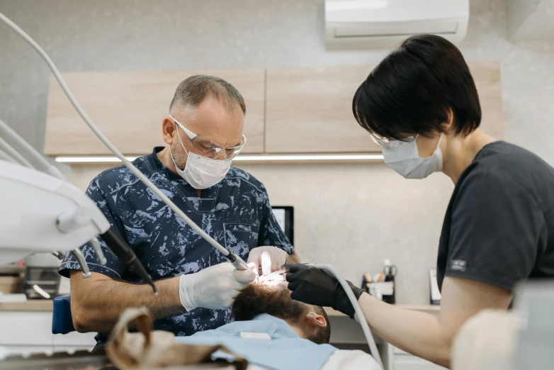 a man and a woman in a dentist's office, by Adam Marczyński, pexels contest winner, hurufiyya, lachlan bailey, paul lung, foreground background, ultra texture