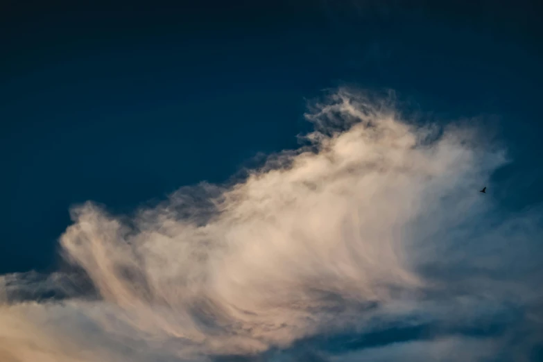 a plane flying through a cloudy blue sky, by Jan Rustem, unsplash, lyrical abstraction, late summer evening, cloud hair, ignant, mystical swirls