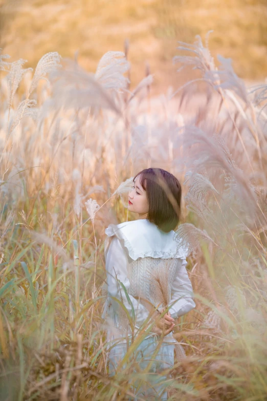 a woman standing in a field of tall grass, by Tan Ting-pho, unsplash contest winner, conceptual art, soft autumn sunlight, ulzzang, 15081959 21121991 01012000 4k, petite girl