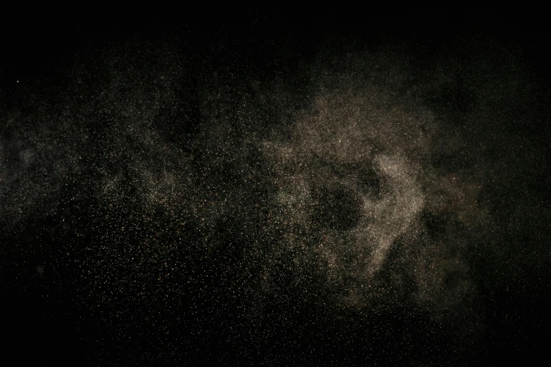a black sky filled with lots of white dust, pexels, light and space, background image, brown mist, volumetric octane render, gold dust