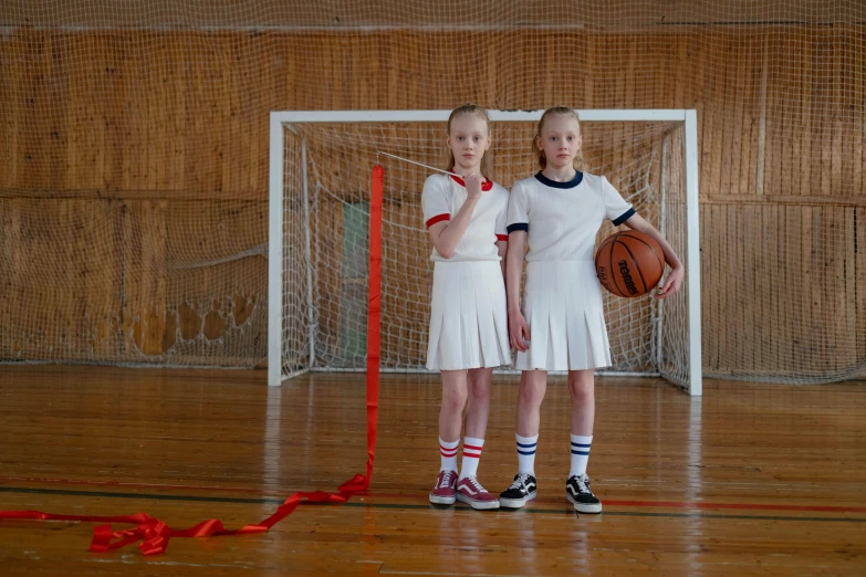 a couple of girls standing next to each other on a basketball court, by Harriet Zeitlin, trending on dribble, dressed as schoolgirl, olga buzova, laces and ribbons, promotional image