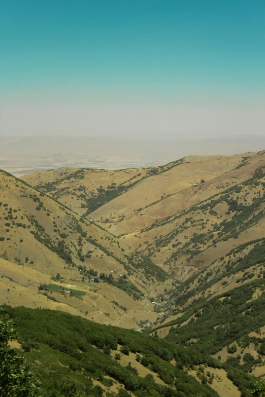 a view of a valley from the top of a hill, by Edward Avedisian, flickr, 2 5 6 x 2 5 6 pixels, persian queen, 4k panoramic, canyons