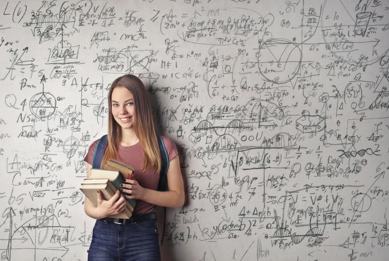 a woman standing in front of a wall with lots of writing on it, academic art, math equations in the background, holding books, teen girl, promo image