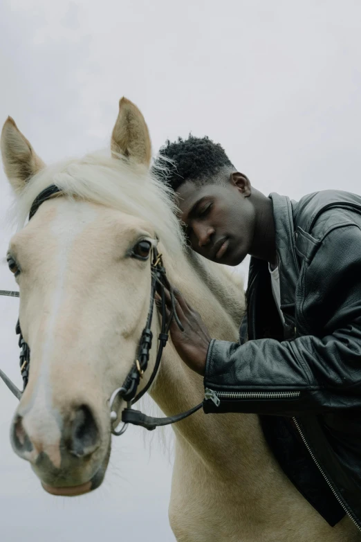 a man riding on the back of a white horse, an album cover, trending on pexels, black teenage boy, sad look, gray skin, luts