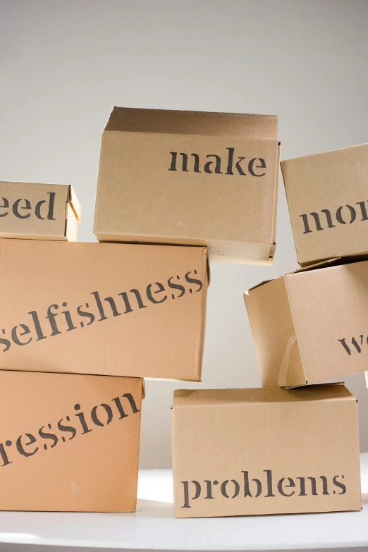 a pile of boxes sitting on top of a white plate, by Will Ellis, messages, stressed expression, placards, skincare