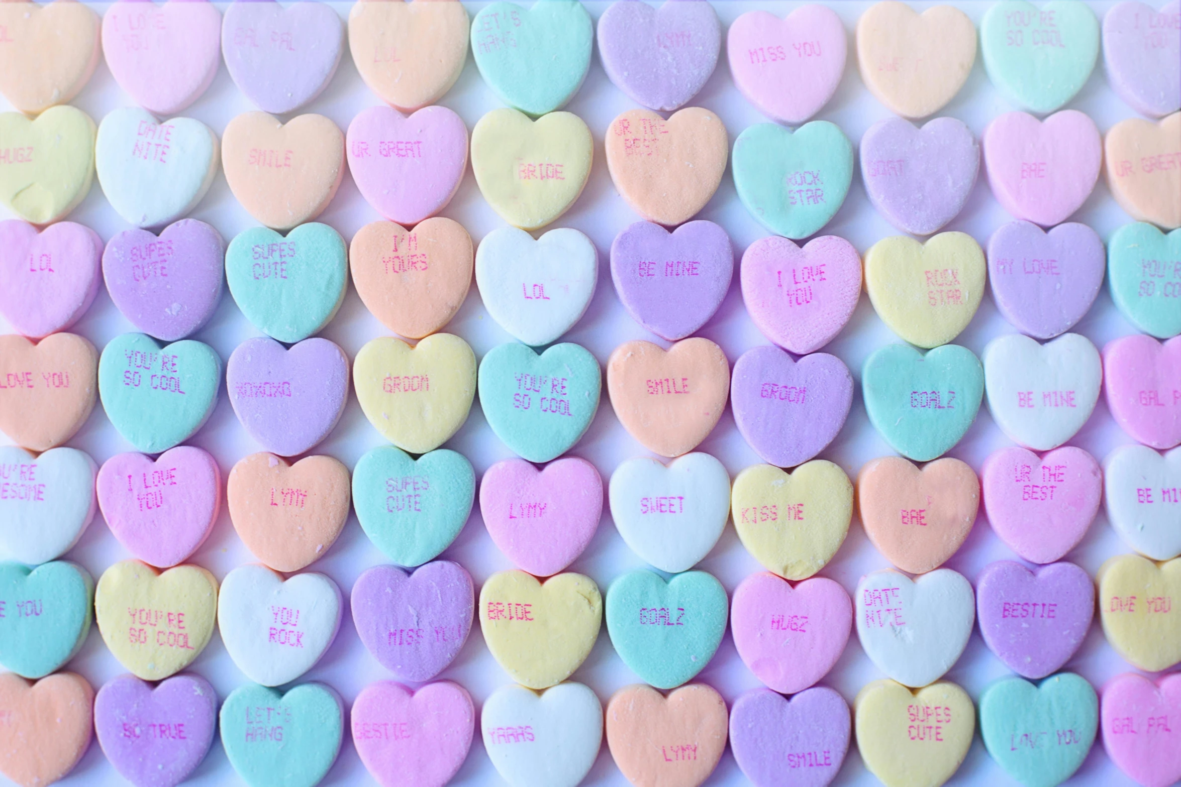 a bunch of candy hearts sitting on top of a table, listing image, ffffound, pastel colored, recipe