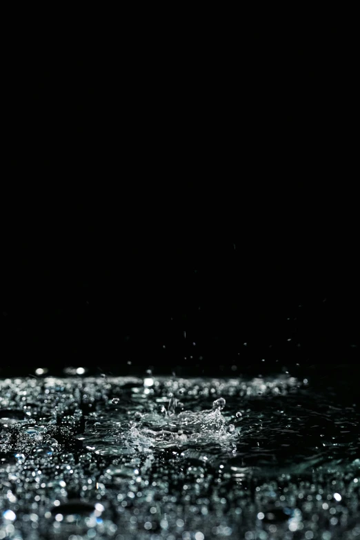 water splashing on the ground in the dark, by Jacob Toorenvliet, gif, hedi slimane, ✨🕌🌙, drops of clean water