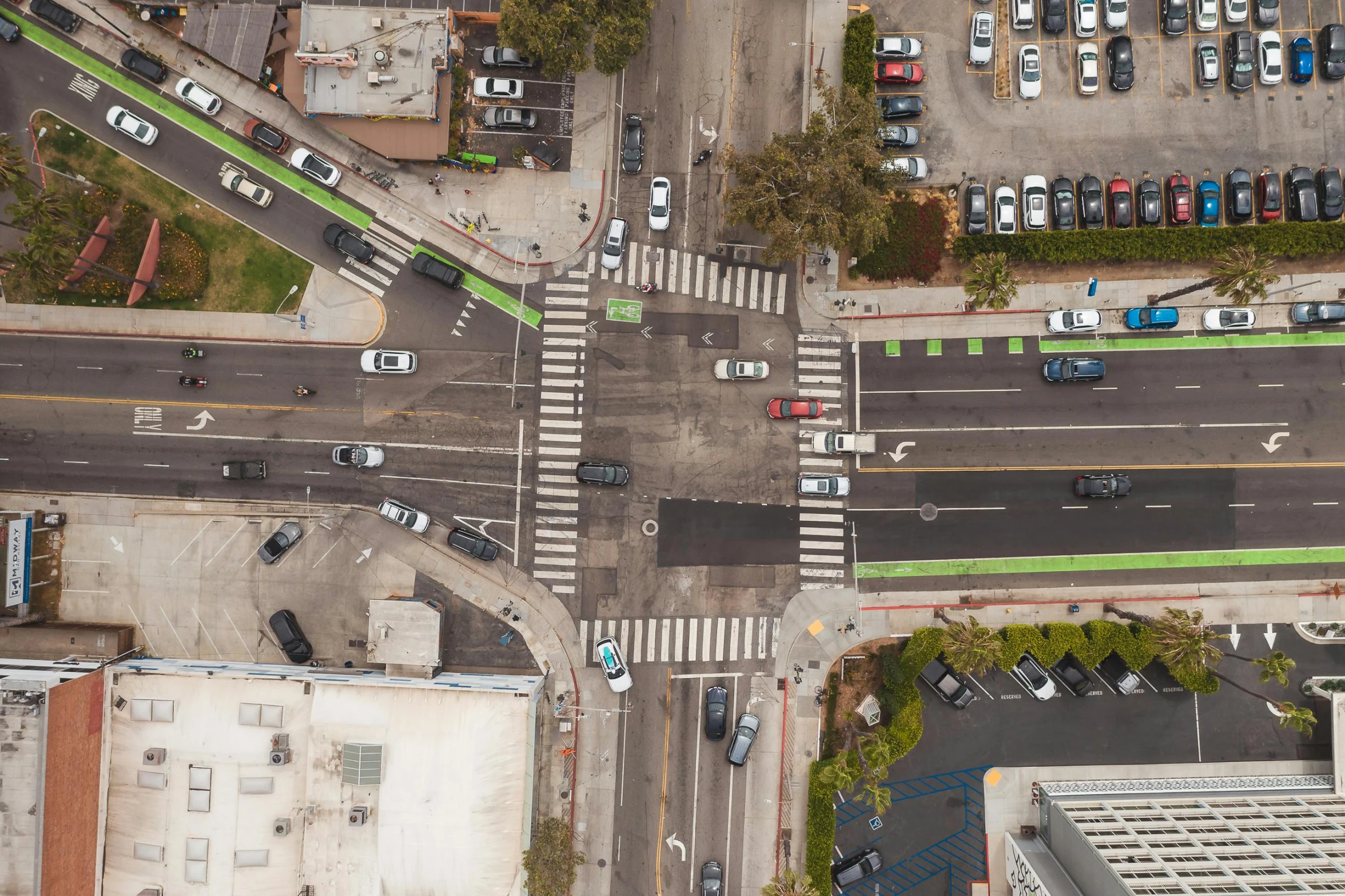 an aerial view of a busy city intersection, by Matt Cavotta, unsplash, square, california, a green, “hyper realistic