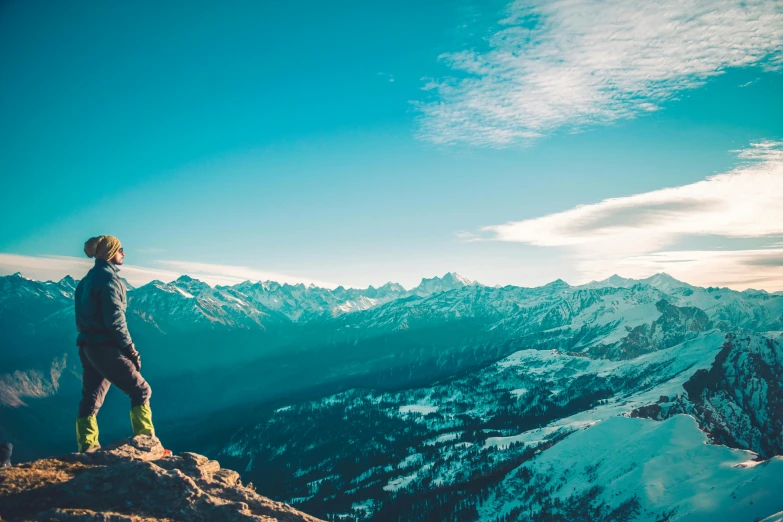 a person standing on top of a mountain, by Niko Henrichon, pexels contest winner, whistler, avatar image, jen bartel, conde nast traveler photo