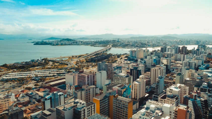 a view of a city from the top of a building, pexels contest winner, hyperrealism, nagasaki, oscar niemeyer, panoramic widescreen view, fan favorite
