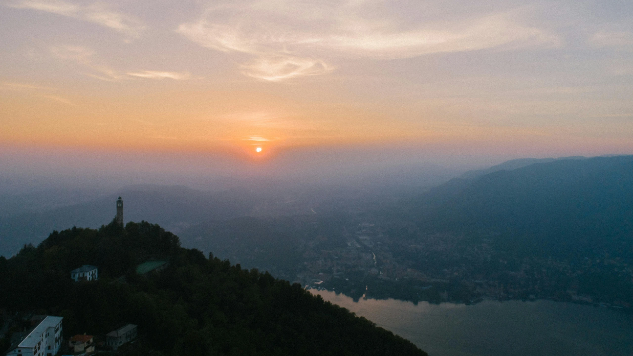 a view of a sunset from the top of a mountain, lake view, surrounding the city, unsplash photography, fan favorite