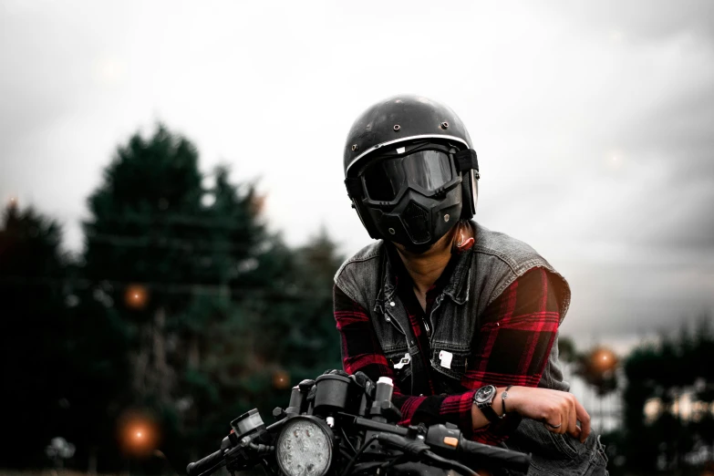 a man sitting on a motorcycle wearing a helmet, a picture, pexels contest winner, lumberjack, photograph of a techwear woman, upper body face shot, australian