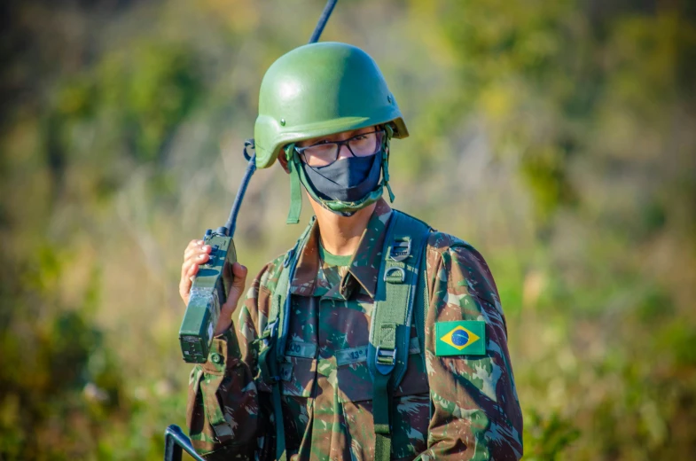 a man in a military uniform holding a radio, by Fernando Gerassi, shutterstock, president of brazil, pokemon military drill, covid, profile pic