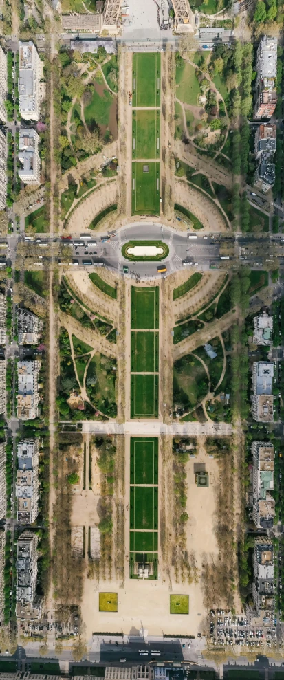 an aerial view of the eiffel tower in paris, an album cover, by Ahmed Yacoubi, unsplash contest winner, berlin secession, formal gardens, intersection, iraq nadar, low quality photo