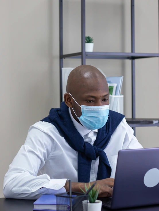 a man sitting at a desk with a laptop wearing a face mask, george pemba, profile image, thumbnail, album