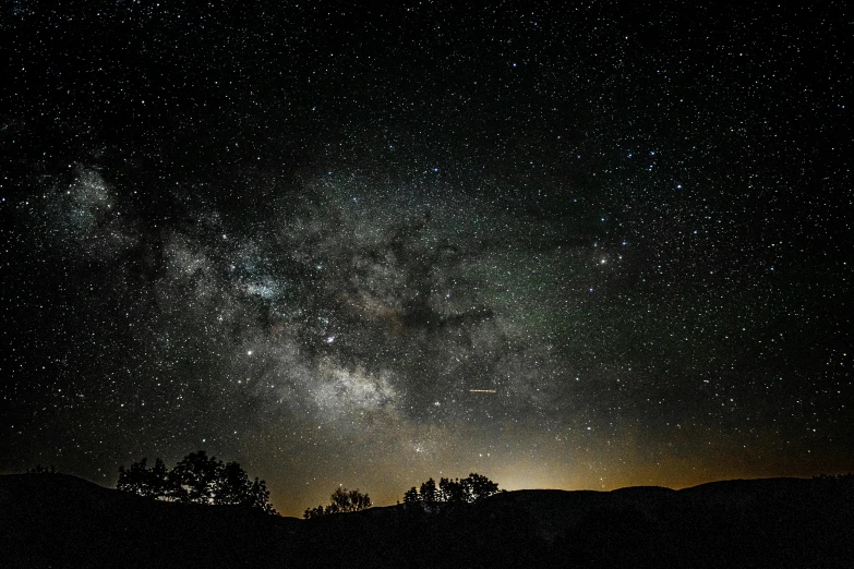 a night sky filled with lots of stars, by Matt Cavotta, unsplash contest winner, space art, meteors falling, 2022 photograph, central california, digital artwork