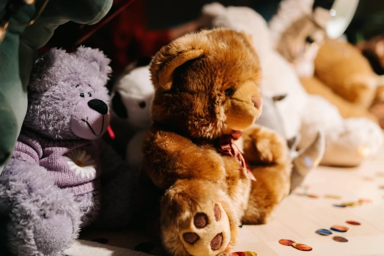 a group of teddy bears sitting next to each other, profile image, up close, toys, afternoon