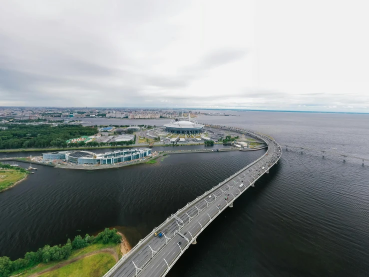 an aerial view of a bridge over a body of water, by Ilya Ostroukhov, pexels contest winner, hurufiyya, neo norilsk, peter the great, with a long, skybox