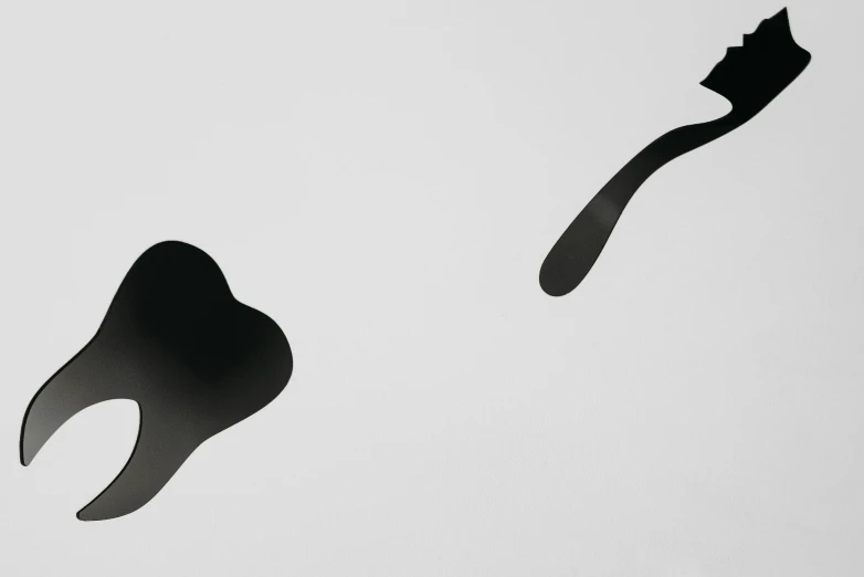 a black and white photo of a toothbrush and a toothpaste, a minimalist painting, inspired by Jean Arp, conceptual art, shadow gradient, two characters, drops are falling from above, kim hyun joo