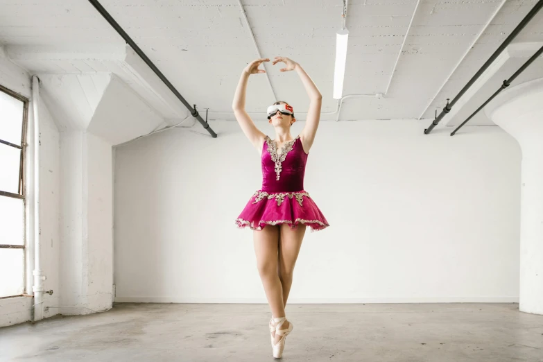 a woman in a pink dress doing a ballet pose, pexels contest winner, jeweled costume, cardboard, lachlan bailey, performing