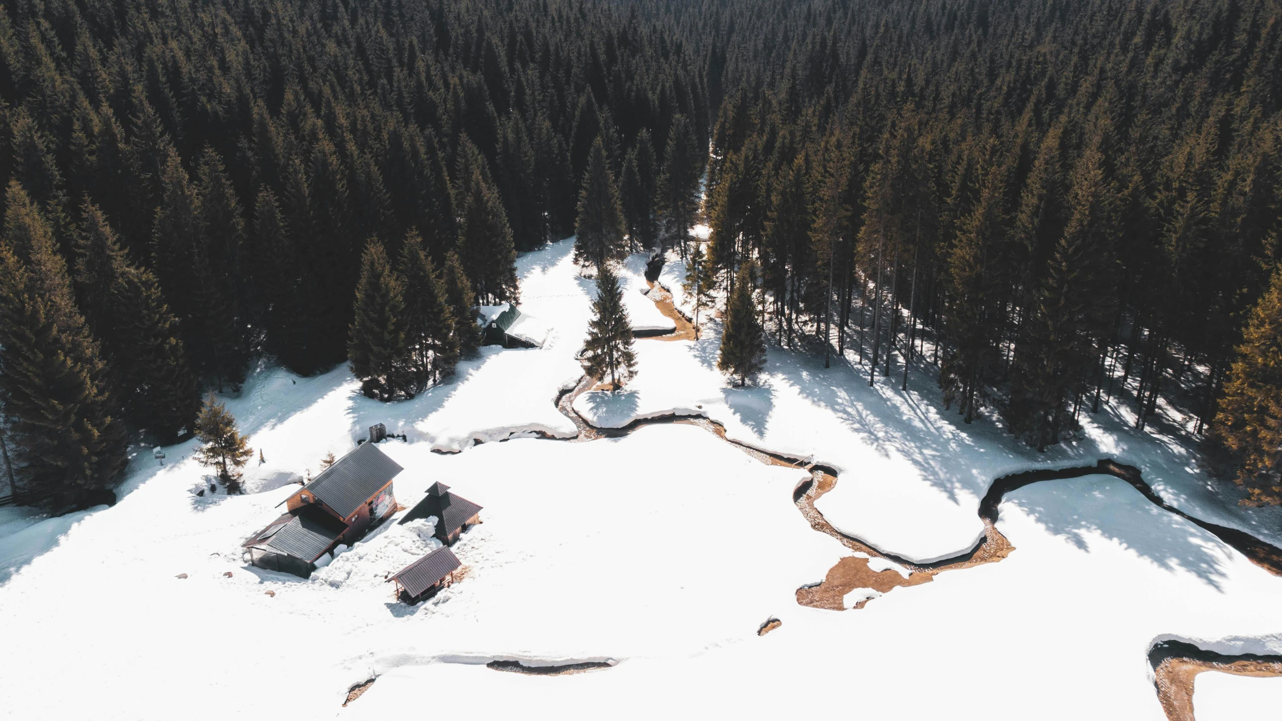 a bird's eye view of a snow covered mountain, pexels contest winner, land art, solitary cottage in the woods, thumbnail, various posed, vacation photo