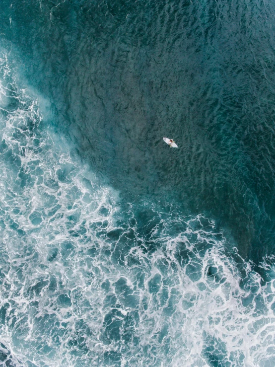 a person riding a surfboard on top of a wave, pexels contest winner, airplane view, manly, ultrawide cinematic, hd footage