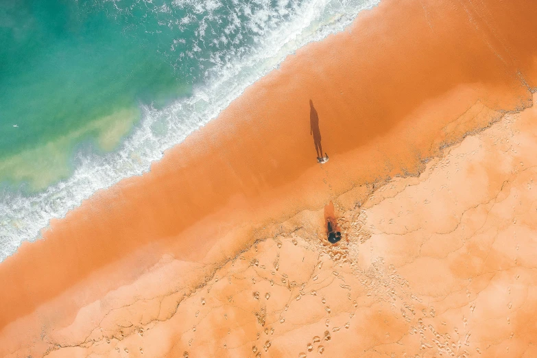 a couple of boats sitting on top of a sandy beach, pexels contest winner, minimalism, birds eye photograph, orange hue, people in beach, “ iron bark