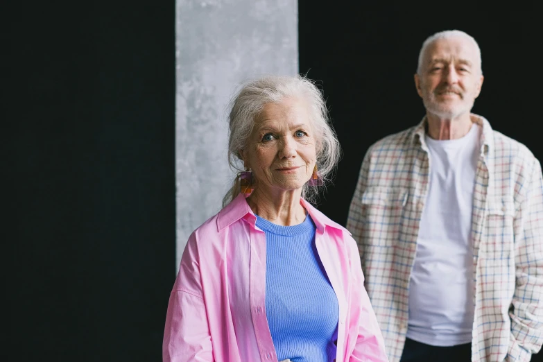 a man and a woman standing next to each other, a portrait, unsplash, hyperrealism, elderly, portrait image
