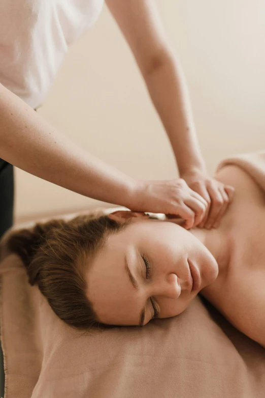 a woman getting a massage at a spa, inspired by Elsa Bleda, renaissance, shorter neck, mid-shot, brown